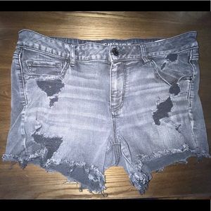 Faded black distressed shorts. Size 16.